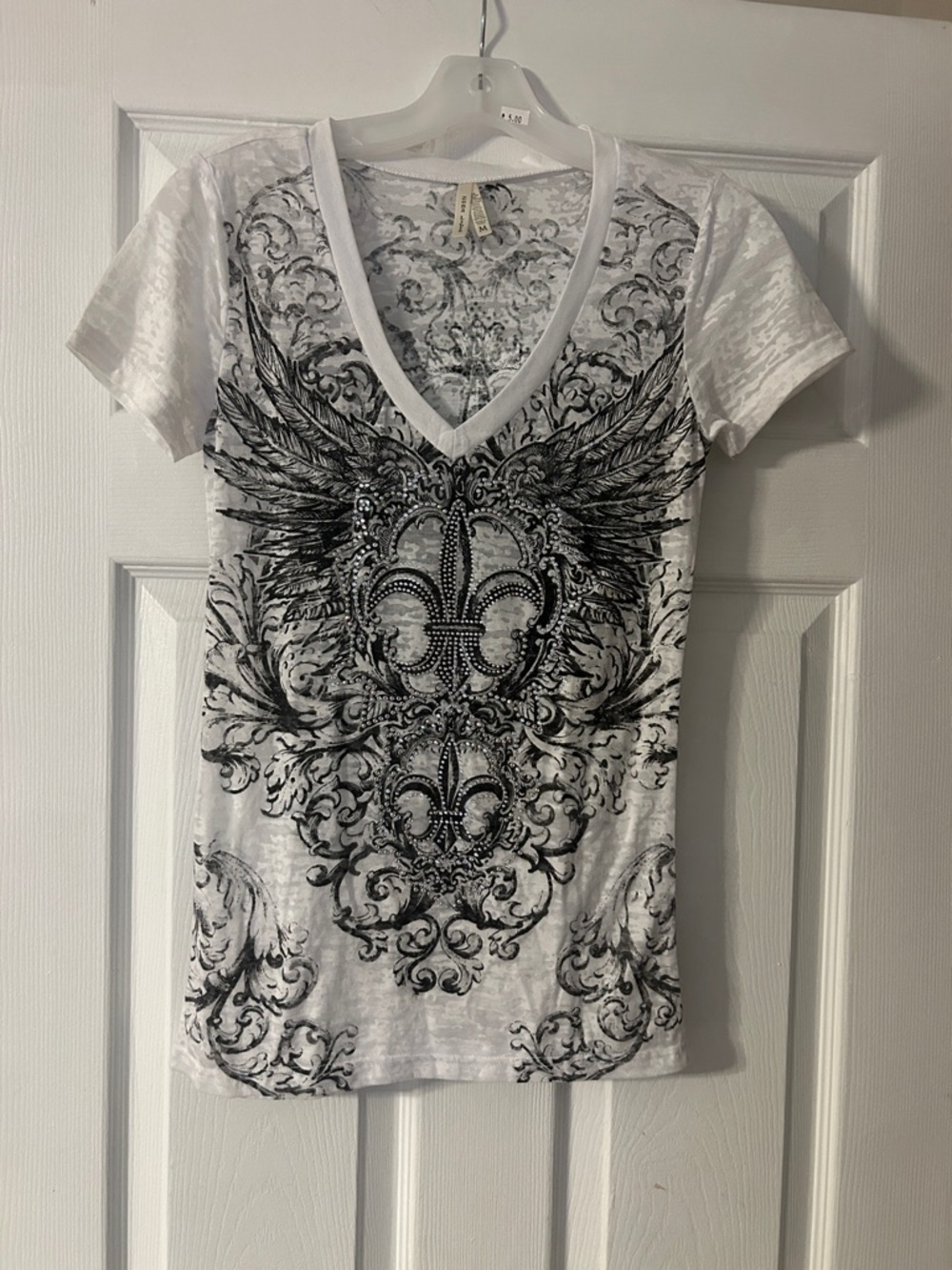 White Graphic V-Neck Top with Fleur-de-Lis Wing Design
